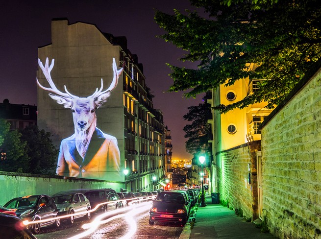 A safari of smartly-dressed wildlife on the streets of Paris projected by Julien Nonnon