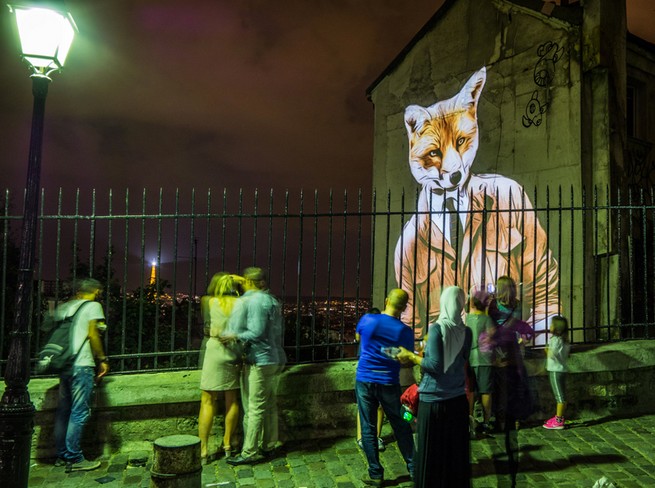 A safari of smartly-dressed wildlife on the streets of Paris projected by Julien Nonnon