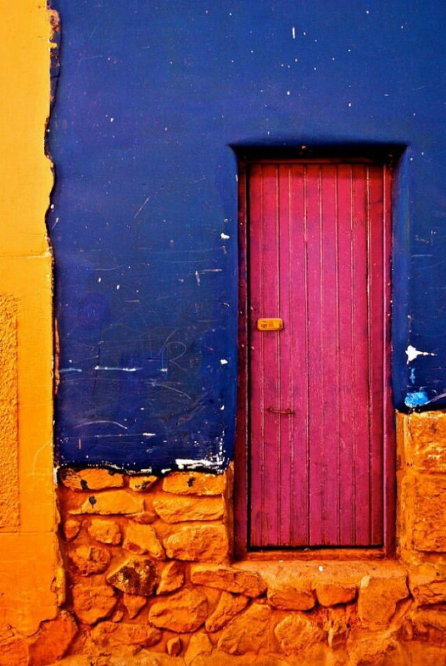Unbelievably Beautiful Doors from Around the World  Unbelievably Beautiful Doors from Around the World Colourful peruvian door blue orange pink