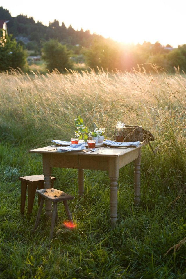 It's Time for Dinner Out! Summer Tables to die for.  It’s Time for Dinner Out! Summer Tables to die for. Summer outdoor table wooden stools hay field