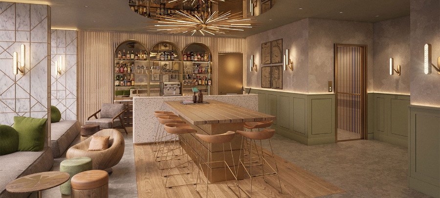 The bar of a Hilton Hotel, with a big gold chandelier, an isle with salmon colored chairs surrounding it and some small round tables with sofas surrounding.  kitzig design studios Kitzig Design Studios- From Germany to the World Interior Motto Hilton Hotel 01 1800x810 1 1