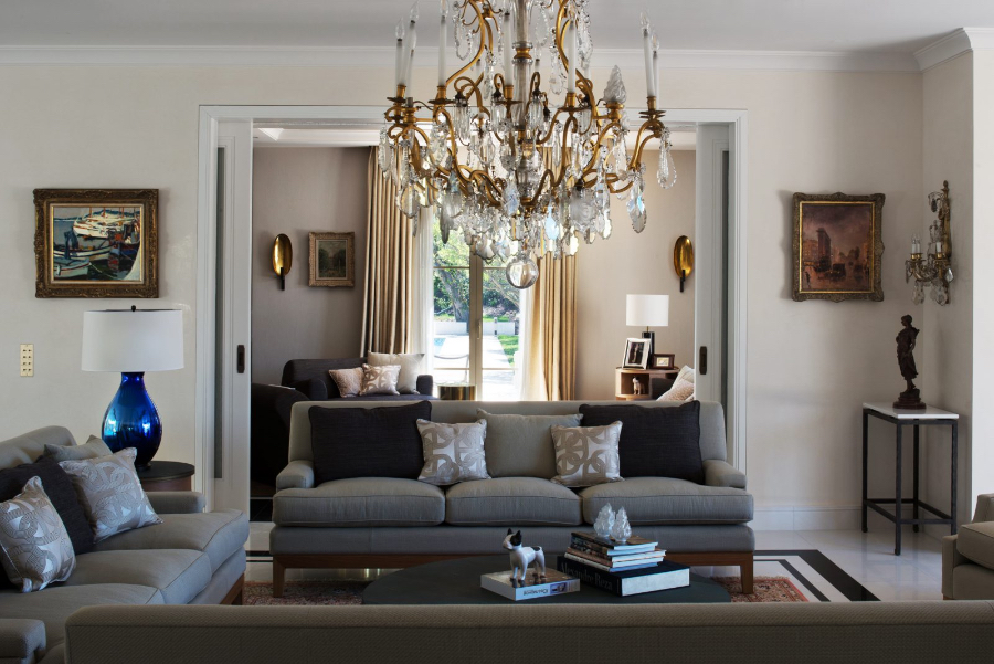 Davide Rizzo Architects Villa Joya living room. Here we have 3 grey sofas around a round table.   davide rizzo architects Davide Rizzo Architects: Best Interior Design Projects Dabide Rizzo Villa Joya P19 09 davide rizzo cannes cap ferrat design Riviera chic Living room chandelier france 1600x0 c default