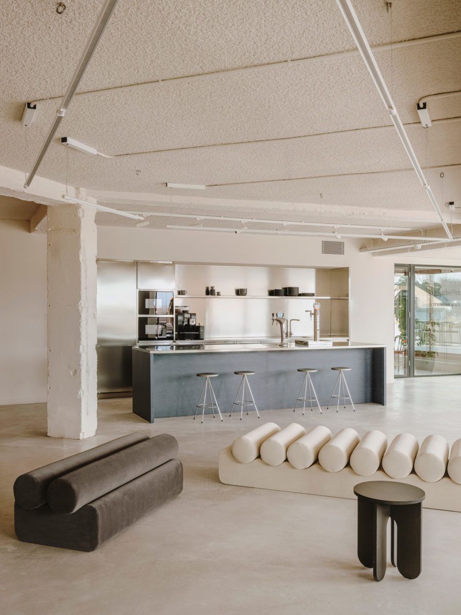 black stool, black sofa, white sofa, kitchen bar, refrigerator mesura Mesura: Get Inspired With Innovative Interior Designs Get Inspired By Mesura Innovative Interior Designs1 7 1
