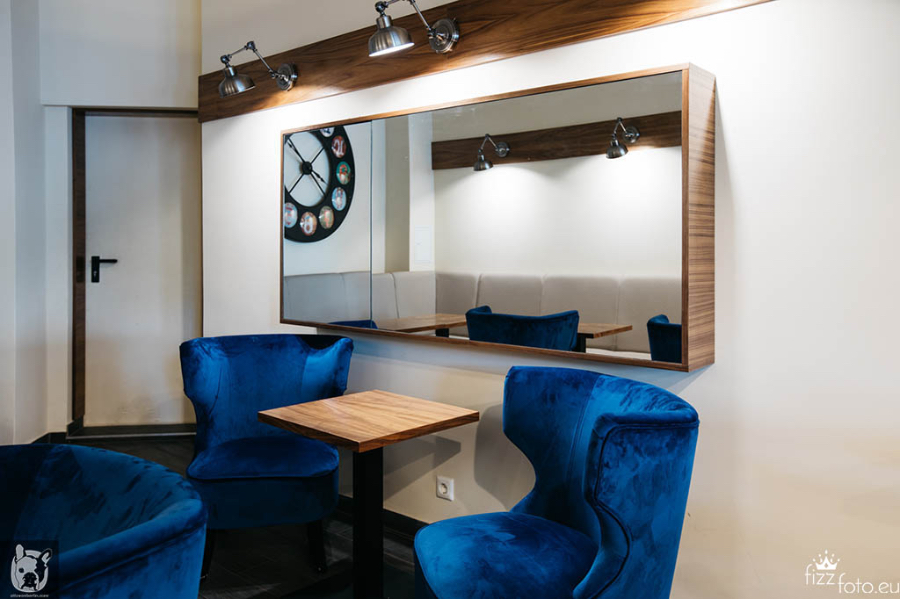 Otto Von Berlin-Interior Design 12 oz lounge area with 3 big blue petrol arm chairs.  otto von berlin Otto Von Berlin-Interior Design Otto Von Berlin 12oz