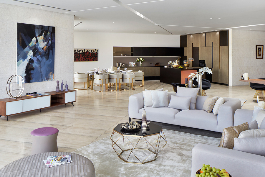 Zen Interiors, living room, dining room, silver leather sofa, silver sofa, leather sofa, brass center table,gold white leather armchair, gold armchair, white armchair, leather armchair. zen interiors Zen Interiors – Best Interior Design Projects Zen interiors 6 1