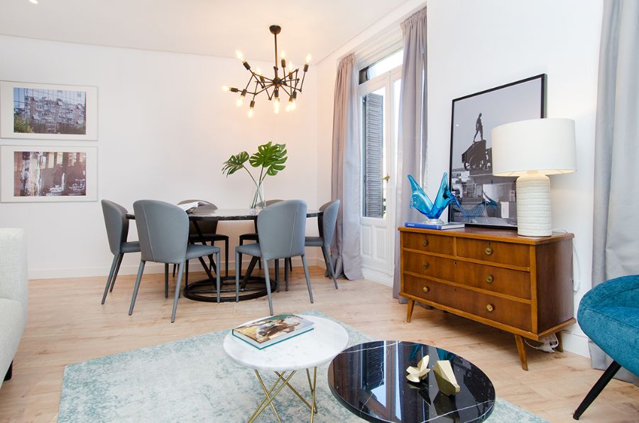 grey dining chairs, black round dining table, black and white center tables, brown console, side tamp, golden suspension lamp estudio marcos mela Estudio Marcos Mela Playful Designs Estudio Marcos Mela Playful Designs1 1 1