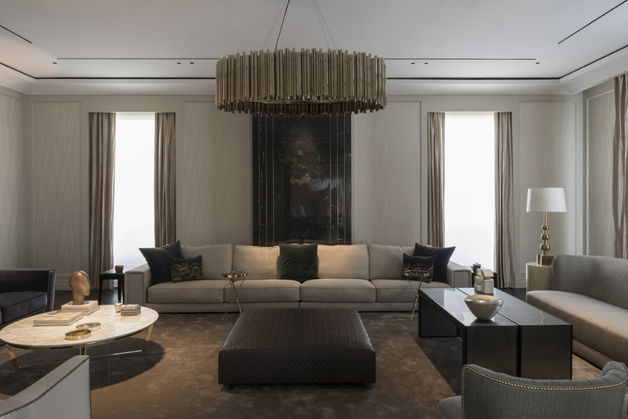 A living room with several upholstery together with three center tables accompanied with a suspension light. vshd design VSHD Design – Minimalist Interior Designs Inspirations Webp