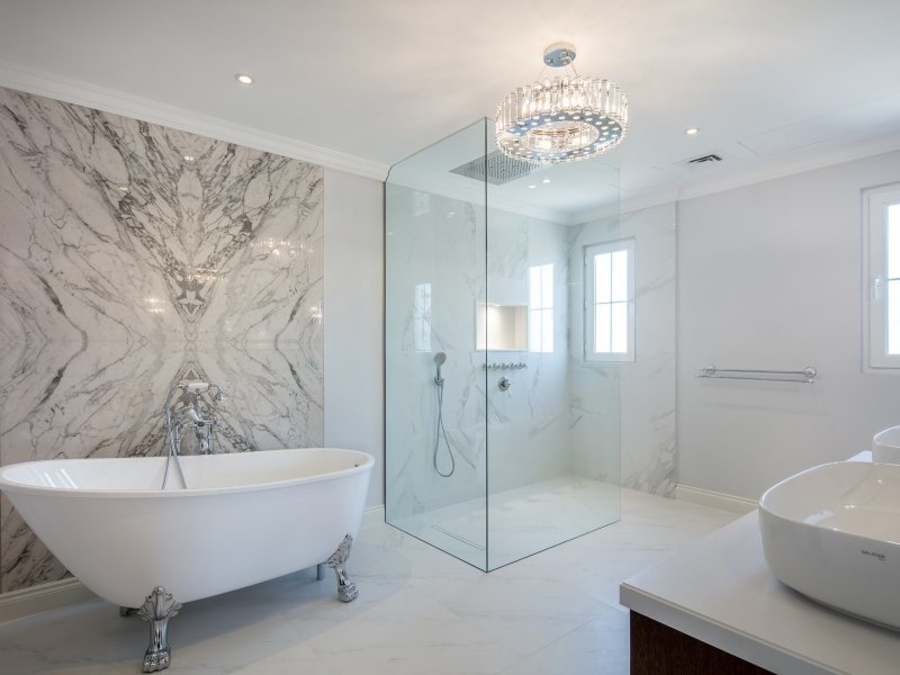 Bathroom with marble walls a custom made bathtub.  cherwell Cherwell – Best Interior Design Inspirations Webp