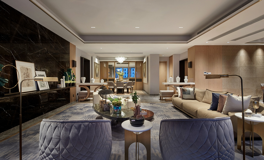 A living room furnished with some bespoke upholstery completed with a custom rug and center table. aedas Aedas – Modern Interior Design Ideas Webp