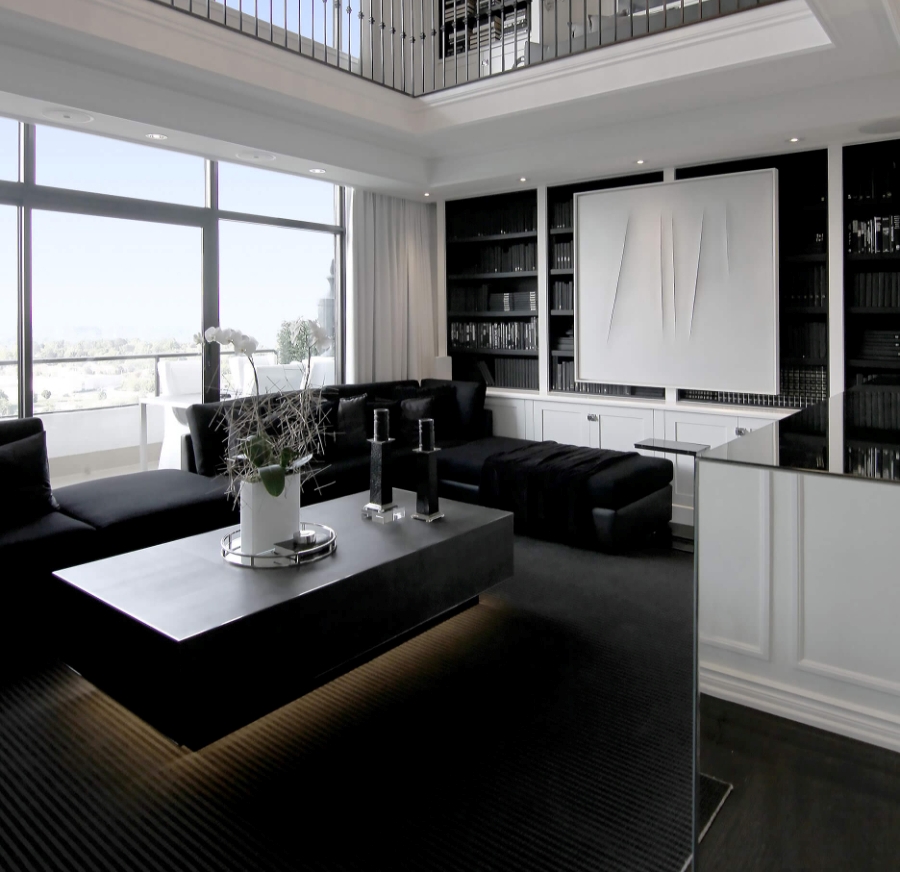 Home decoration ideas by Tomas Pearce Interior Design Consulting Inc. . This living room is for people who like the combination of black and white. The sofa and the coffee table are in black and all of the rest furniture is white.  home decoration ideas Home decoration ideas by Tomas Pearce Interior Design Consulting Inc. Applewood place Home decoration ideas