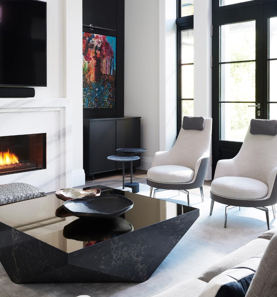 Coe Mudford Interior Design: Modern home decoration ideas. This living room has a white fireplace to the ceiling, a white rug, two armchairs in white, and to contrast has a big coffee table in black.  modern home decoration ideas Modern home decoration ideas: Coe Mudford Interior Design CMID GrandTouring 46Teddington 091 1