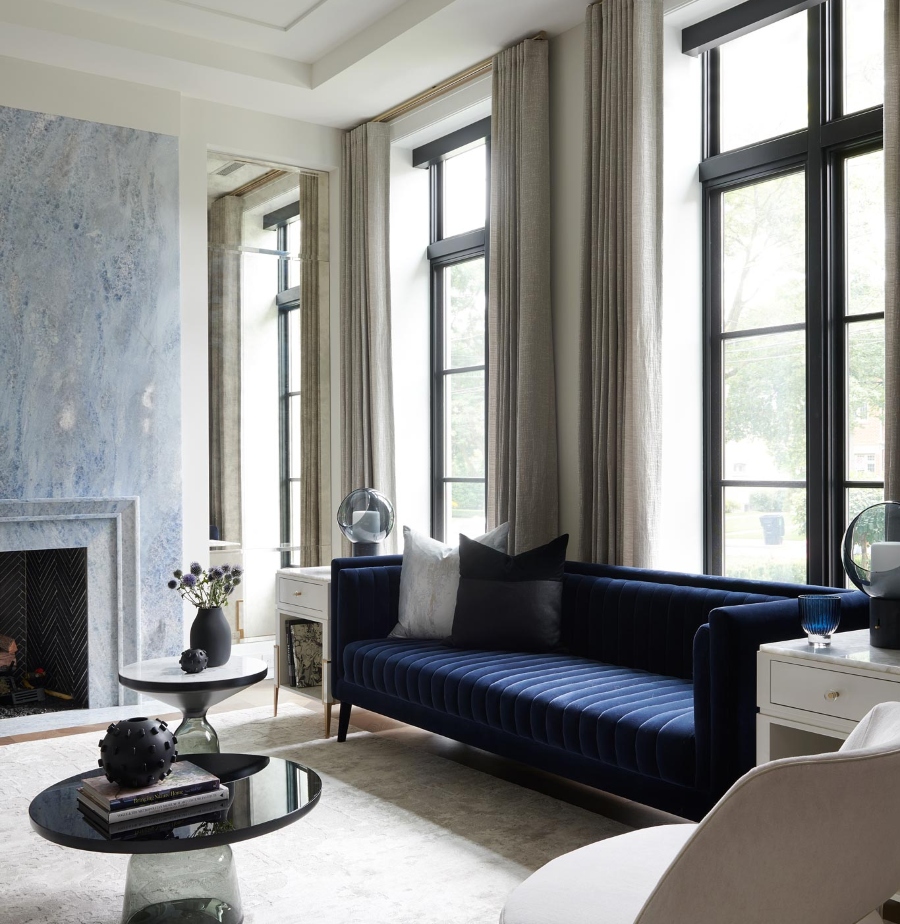 Coe Mudford Interior Design: Modern home decoration ideas. This living room has the focus center is a fireplace in blue marble, a blue velvet sofa, two round coffee tables in black and to cover all the space is a white rug.  modern home decoration ideas Modern home decoration ideas: Coe Mudford Interior Design Coe Mudford Interior Design Modern home decoration ideas  Knightwood Park1 3 1