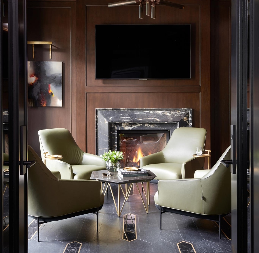 Coe Mudford Interior Design: Modern home decoration ideas.This seating area has a wood fireplace with a marble frame and in the center of the room has a marble and gold details coffee table and its surrounded by four armchairs in green.  modern home decoration ideas Modern home decoration ideas: Coe Mudford Interior Design Coe Mudford Interior Design Modern home decoration ideas  Knightwood Park5 1