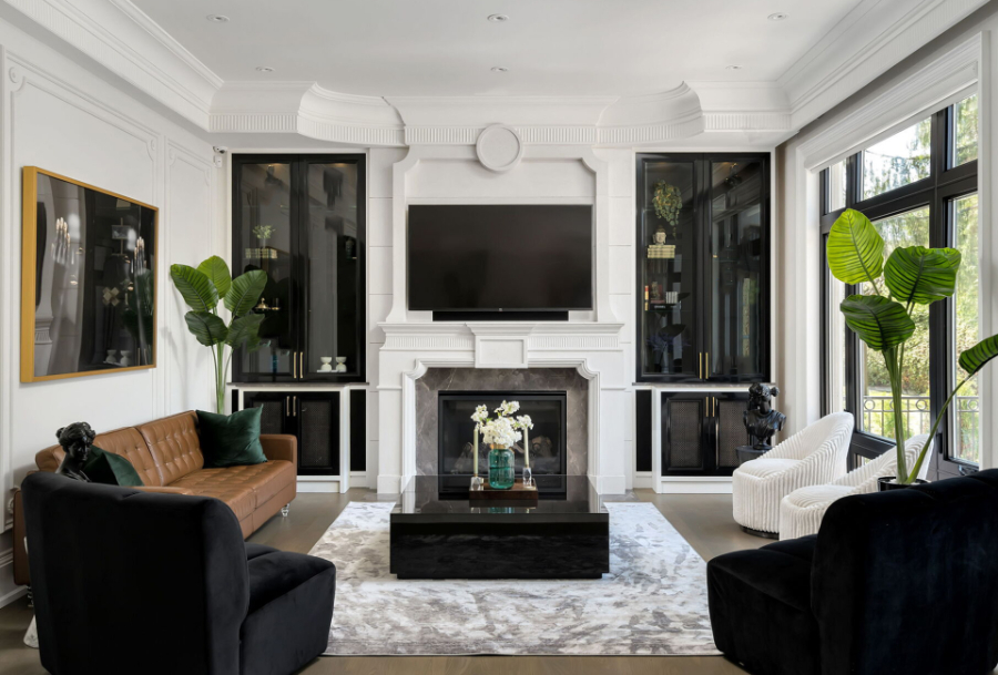 Home decoration ideas by Tomas Pearce Interior Design Consulting Inc. . This living room is a comfy room that featured one brown sofa, two armchairs in white and two black armchairs. The center of the room is white and grey and has a black coffee table.  home decoration ideas Home decoration ideas by Tomas Pearce Interior Design Consulting Inc. Dove lane 4