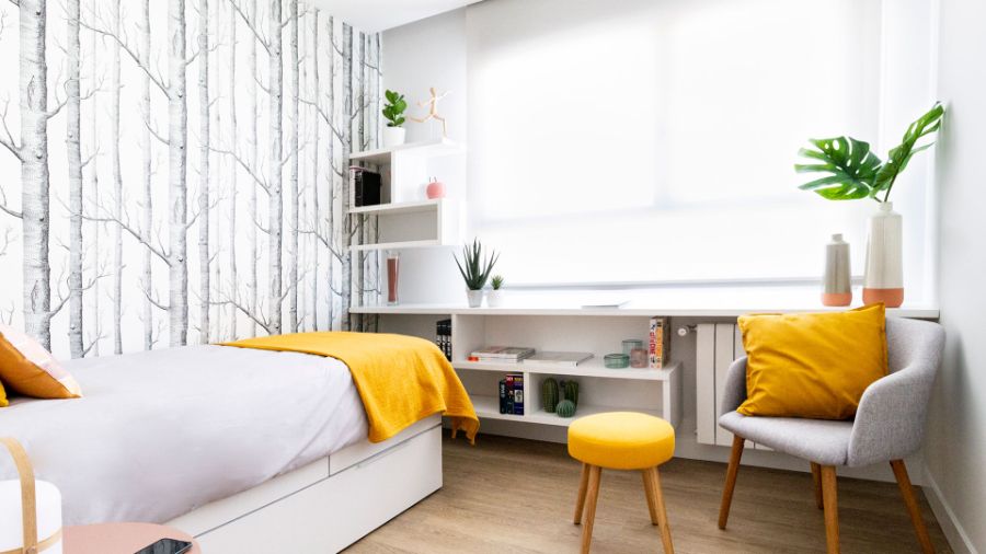bedroom by kiga with single bed and grey armchair kiga Kiga Modern Style Inspirations Kiga Modern Style Inspirations1 7 1