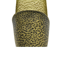 ECLIPSE is a Modern Wall Lamp. The structure of this wall lamp is like a folded sheet made of hammered brass