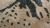 MACUSHI | Rectangular Wool Rug with Flower Patterns by BRABBU