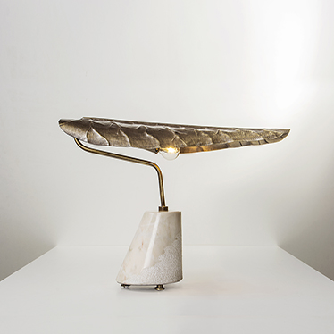 CALLA Table Lamp portrays the delicate calla lily flower with origins in South Africa. From its graceful aged brass top in the shape of an elegant leaf to the luxurious carrara marble base, CALLA’s beauty is undeniable.