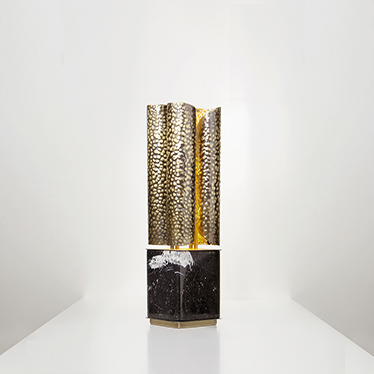 VELLUM Table Light is nature transformed by the man’s hand. It comes from the ancient manuscripts, where messages were written in VELLUM, a fine and translucent material. Composed by hammered brass and nero marquina marble, its elegance exhales power thro